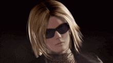 a woman with blonde hair wearing sunglasses and a scarf