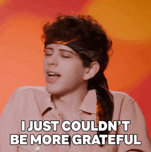 a man wearing a headband says i just could n't be more grateful