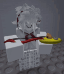 a statue of a girl with a bow and arrow on top of a white block with chinese writing on it