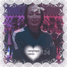 a photo of a man with a heart that says namphaea canon on it