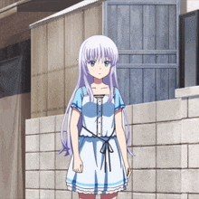 a girl with purple hair and a blue dress is standing in front of a brick wall