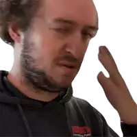 a man with a beard wearing a black shirt that says international poker on it