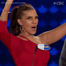 a woman in a red dress with a name tag that says madeline on it