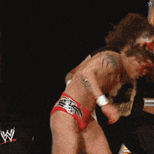 a wrestling match is being shown on a wwe channel