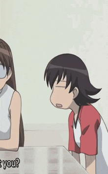 a girl and a boy are sitting at a table and the girl is asking the boy if he is you