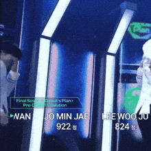 jo min jae 922 and lee woo jae 824 are standing next to each other on a stage