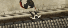 a man with a sword is falling off a building