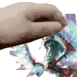 a close up of a person 's hand holding a piece of paper with a picture of a dragon in the background .