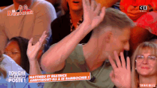 a group of people watching a tv show called rabibocher