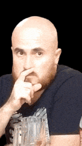 a bald man with a beard wearing a shirt that says california