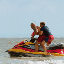Falling Off A Jetski GIF - Baywatch Zac Efron Dwayne Johnson GIFs