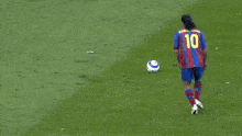 a soccer player with the number 21 on his jersey is running on the field