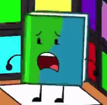 a cartoon book with a sad face is sitting on a table with a microphone .