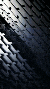 a dark background with a geometric pattern of lines