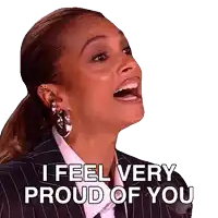 a woman in a suit and earrings is saying i feel very proud of you