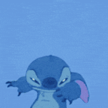 a close up of a stitch cartoon character with its mouth wide open