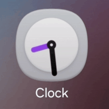 a clock with a purple hand and the word clock below it