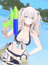 a girl in a bikini is holding a water gun in her hand