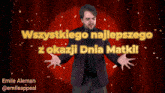 a man in a suit stands in front of a red curtain with the words " wszystkiego najlepszego z okazji dnia matki "