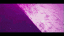a purple and pink background with a purple circle in the middle .