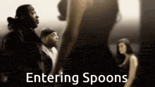 a group of people standing next to each other with the words " entering spoons " on the bottom right