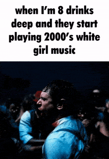 a group of people are playing 2000 's white girl music in a dark room .