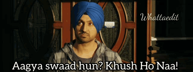 a man wearing a blue turban says 