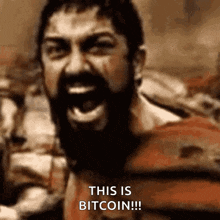 a man with a beard is screaming and says this is bitcoin !!!