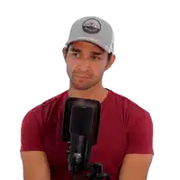 a man wearing a hat that says ' columbia ' on it