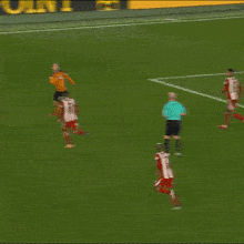 a soccer goal with a sign behind it that says mkm