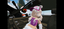 a girl in a pink hat with the letter j on it