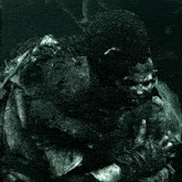 a couple of monsters standing next to each other with one having ears