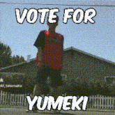 a man is standing in front of a house with the words vote for yumeki