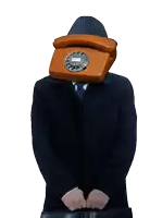 a man in a suit has an orange telephone in front of his head