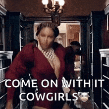 a woman in a red bodysuit is dancing in a hallway with the words `` come on without cowgirls '' .