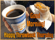 a person holding a cup of coffee next to a sandwich that says " good morning "