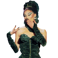 a woman wearing a green dress and gloves is covering her mouth with her hand