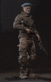 a man with prosthetic legs is holding a sniper rifle