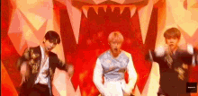 a group of men are dancing on a stage in front of a tiger .