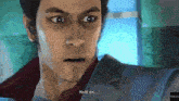 a man in a suit says hold on in a video game scene