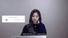 a woman is sitting in front of a laptop with a screen that says ' circles ' on it