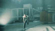 a blurry picture of a man running in a room