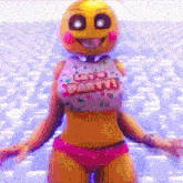 chica from five nights at freddy 's is wearing a pink bikini and a white shirt that says go party .