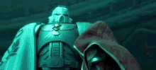 a close up of a statue of a man in armor with a cape on .