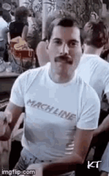 Punch Freddie GIF - Punch Freddie Freddie Mercury GIFs