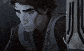a close up of a man 's face with the letter j visible