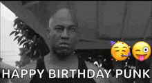 a black and white photo of a man with the words " happy birthday punk "