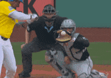 a baseball player in a yellow jersey with the letter k on the back of it