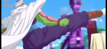 a man in a white cape is kicking a purple and green monster .