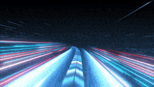 a blurred image of a tunnel with blue and red lights coming out of it